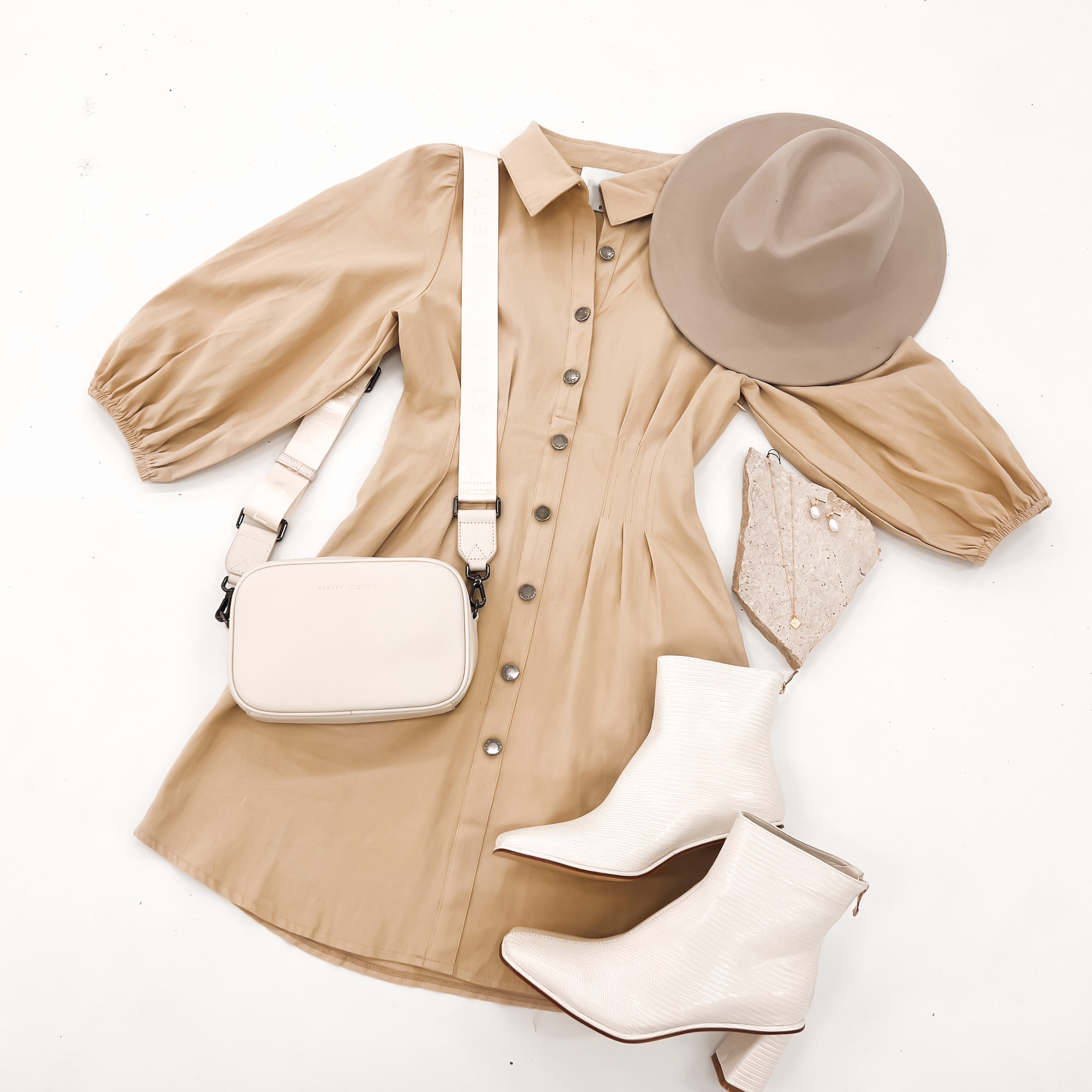 Look stunning in our Callan Mini Dress Beige!