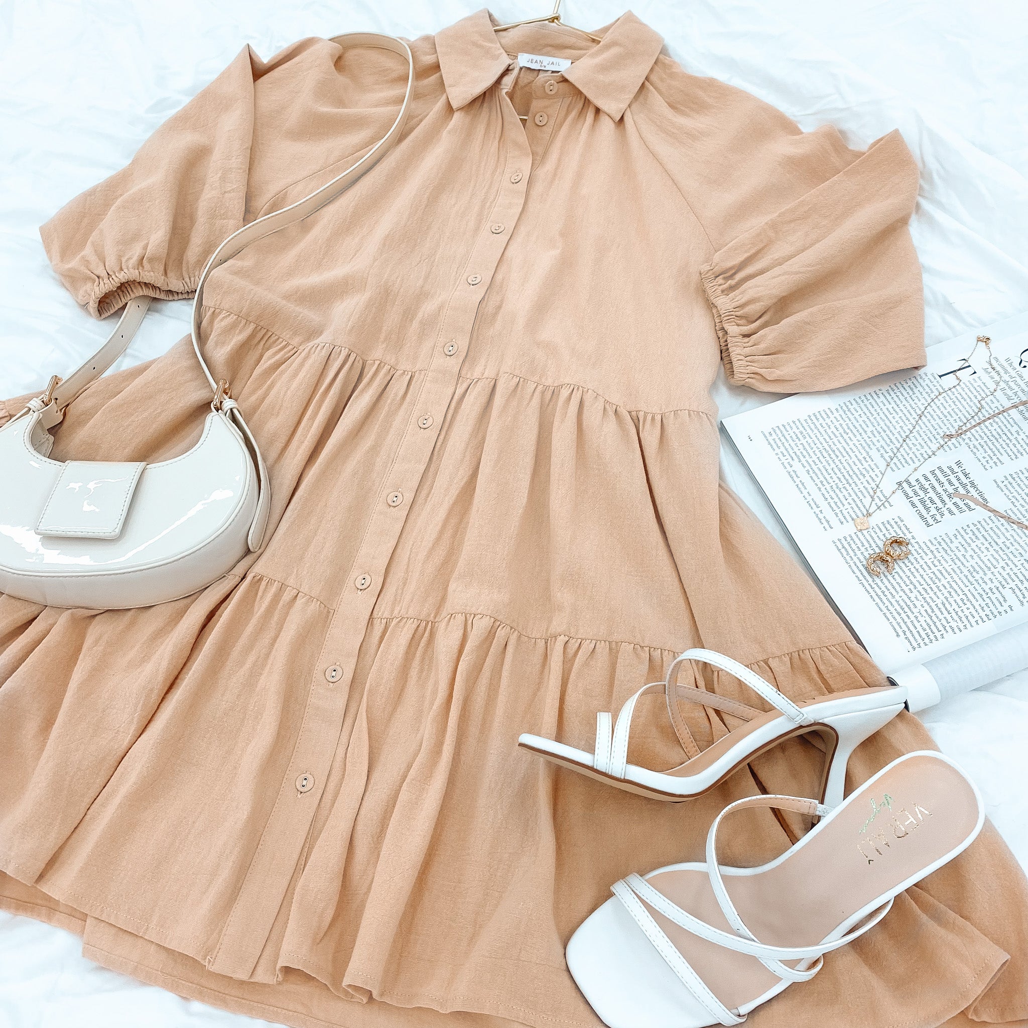 The Jared Mini Dress Beige speaks for itself